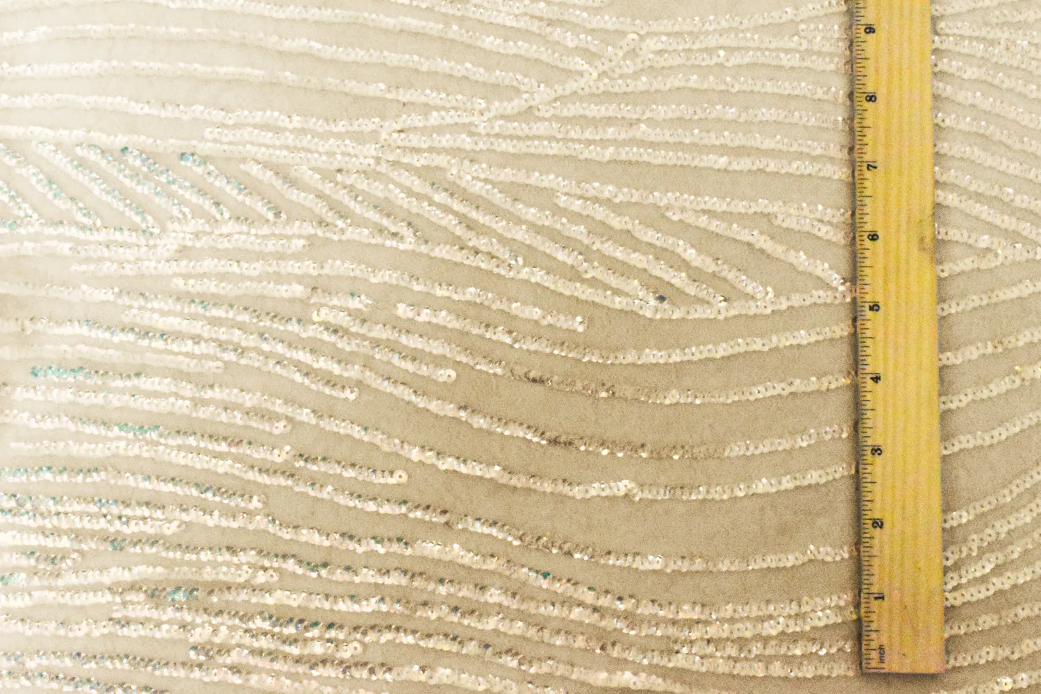 Iridescent Beige Wave Sequined Poly Floral Lace Knit Fabric